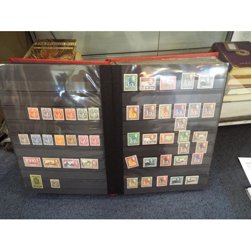 62 - Four stamp albums to include Argentina, Cuba, Dubai, Magyar, Colombia etc