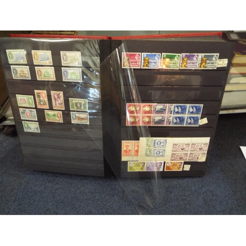 62 - Four stamp albums to include Argentina, Cuba, Dubai, Magyar, Colombia etc