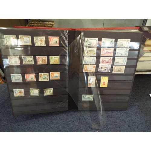 62 - Four stamp albums to include Argentina, Cuba, Dubai, Magyar, Colombia etc