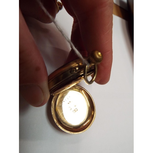 179 - A 9ct gold cased ladies pocket watch the pictorial dial depicting a suffragette vote for women with ... 