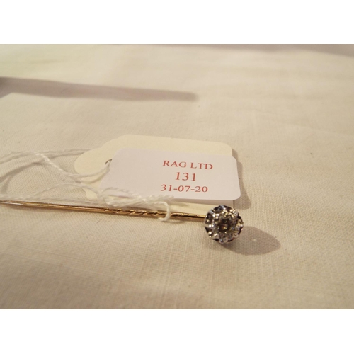 131 - A diamond set stick pin approx size 4ct
