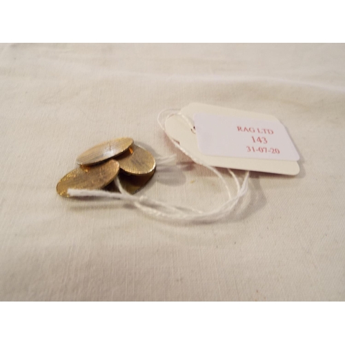 143 - A pair of 12ct gold gent's cufflinks