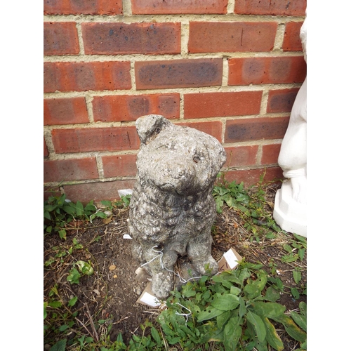 151 - A concrete garden dog ornament