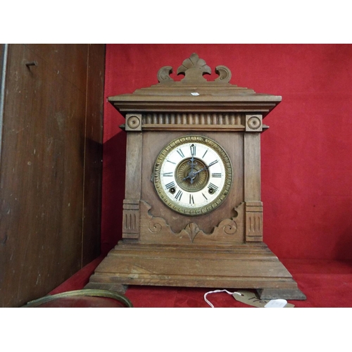170 - An Ansonia oak framed clock (spares or repair)