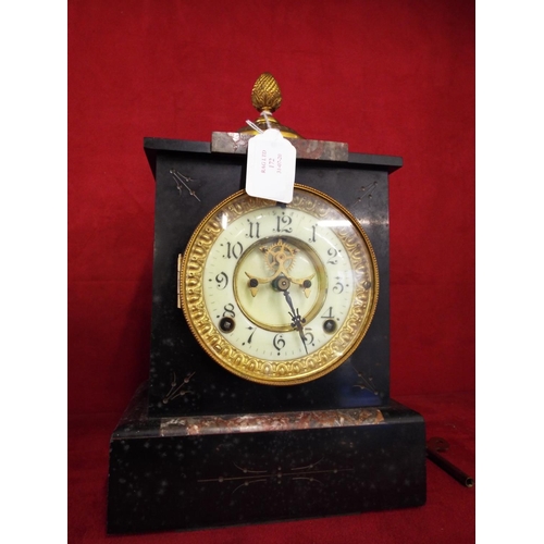 172 - A Victorian marble mantel Ansonia clock enamel dial with Arabic numerals and acorn finial