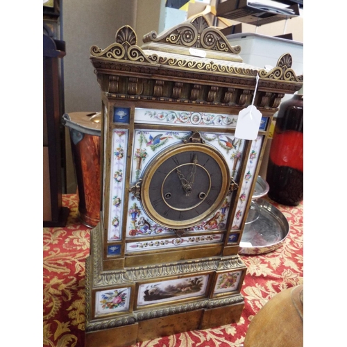191 - A 19thC Bourdin of Paris gilt bronze mantel clock having porcelain panel decorated with flowers, fru... 
