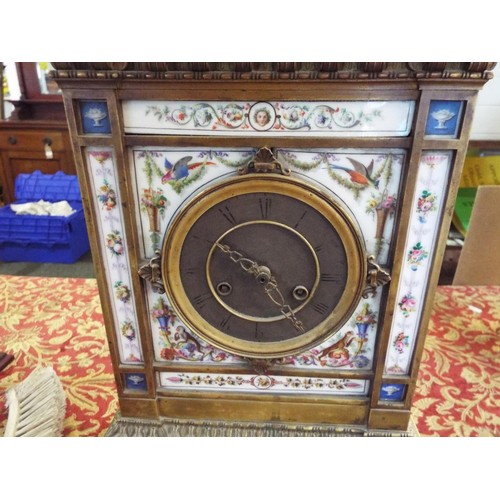 191 - A 19thC Bourdin of Paris gilt bronze mantel clock having porcelain panel decorated with flowers, fru... 