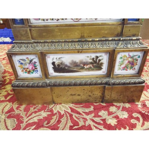 191 - A 19thC Bourdin of Paris gilt bronze mantel clock having porcelain panel decorated with flowers, fru... 