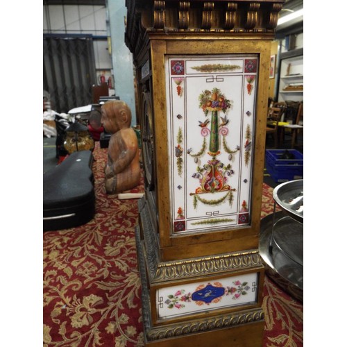 191 - A 19thC Bourdin of Paris gilt bronze mantel clock having porcelain panel decorated with flowers, fru... 