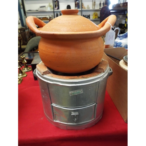 209 - A Tunisian terracotta tagine cooking vessel