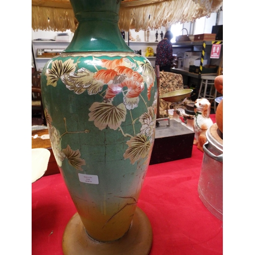 210 - An Oriental hand painted lamp base with floral and bird decoration