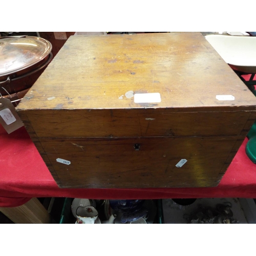 212 - A Victorian wooden box with brass handles and a trade label relating to royalty