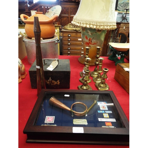 220 - A cased post horn, postal insignia and a copper horn