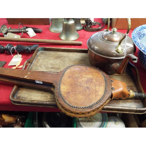 224 - A copper and brass kettle, bellows and a wooden tray