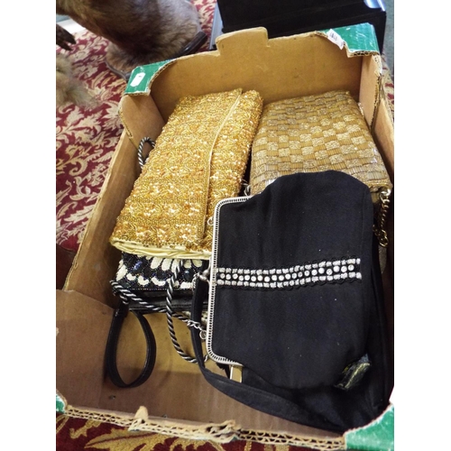 233 - A box of vintage clutch bags