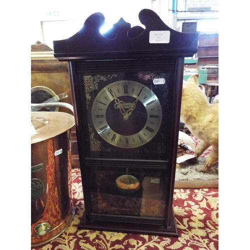 235 - A stained wood wall clock