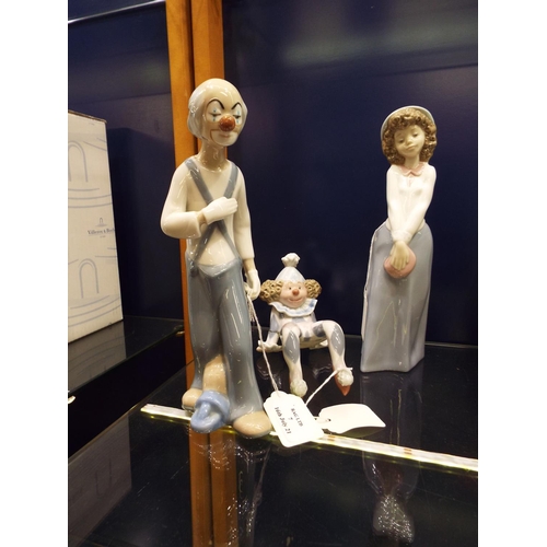 7 - A boxed Nao figurine 'Esperando el Tren' and a Lladro pirouette clown A/F and a Cascades clown with ... 