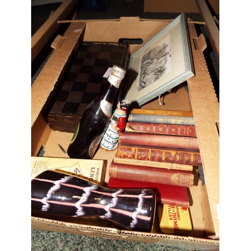 255 - A mixed selection of items to include draughts, eight assorted books to include Ruskin, South East E... 