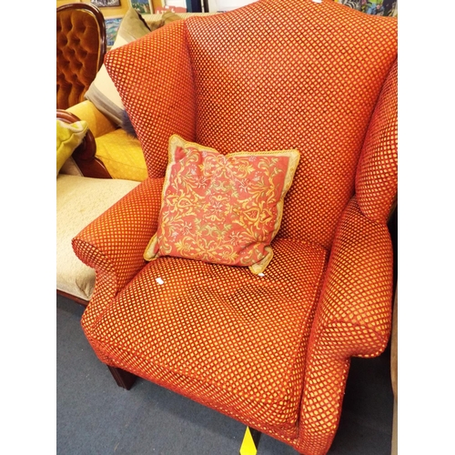 417 - A Parker and Farr wingback armchair in burgundy and gold upholstery