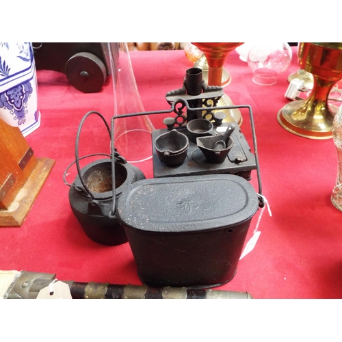 298 - A Crescent miniature aga with coal bucket and shovel, saucepan and boiling pot, Billy can and glue p... 