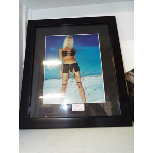 377 - A mounted framed and glazed signed photograph of 'Caprice'