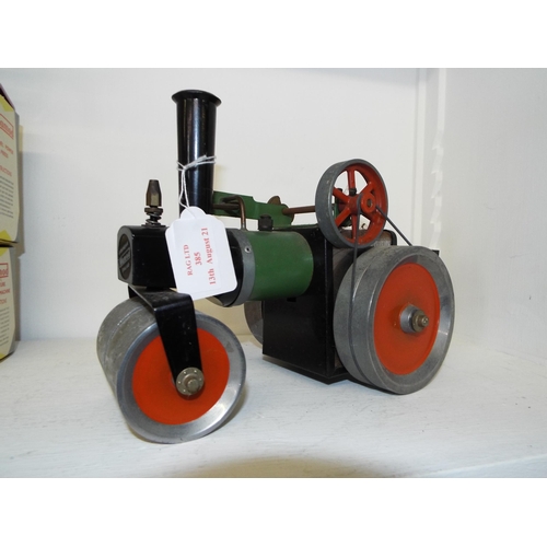 385 - A Mamod steam roller LA fitted with reverse control, whistle, boiler, sight glass and steering exten... 