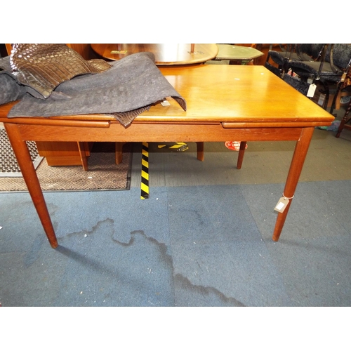 727 - A mid-century teak extending dining table