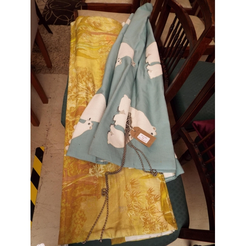 502 - Two Roman blind's, one having polar bear decoration the other floral