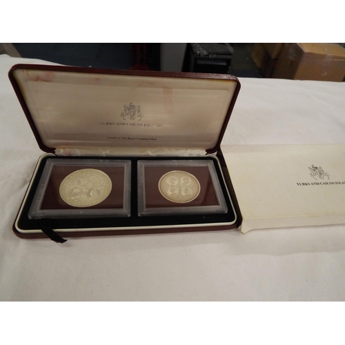 116 - A Turks and Caicos Islands proof set of coins 20 crowns and 50 crowns