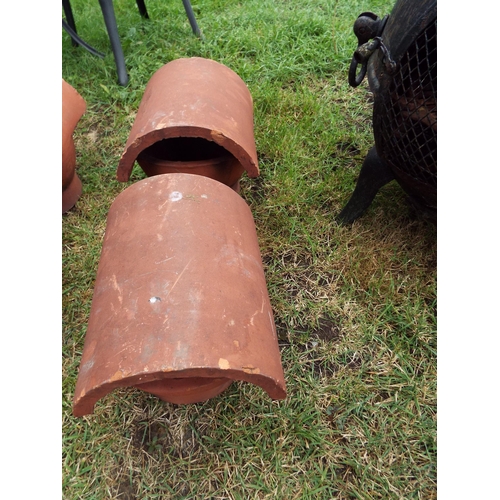 160 - A pair of terracotta chimney cowlings