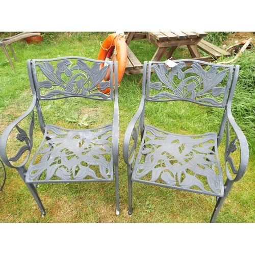 165 - A pair of cast aluminium green elbow chairs