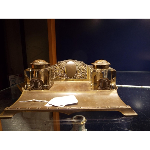 61 - A French brass and glass inkwell