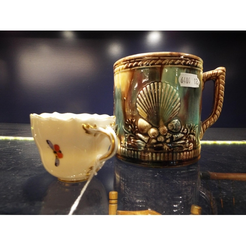 81 - A Meissen coffee can with gilt banding and bird decoration together with a Wealden shell patterned m... 