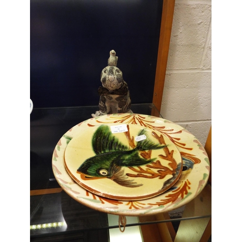 86 - Two French faience plates with fish decoration and a pottery rabbit