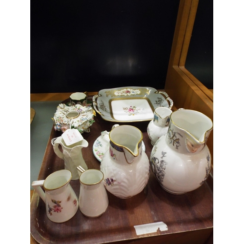 100 - A mixed selection of china to include Crown Derby jug, Coalport jugs, cake plate, candle holder etc