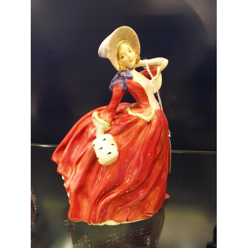 11 - A Royal Doulton figurine 'Autumn Breeze', HN 1934 dated 1939