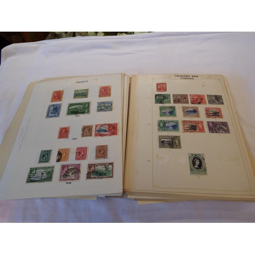 110 - An album of worldwide stamps to include Grenada, India, Eire, Jamaica, Trinidad, Tunis, Turkey, Pitc... 