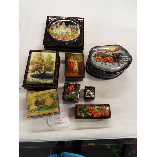 177 - A selection of black lacquered Russian trinket pots with pictorial decoration