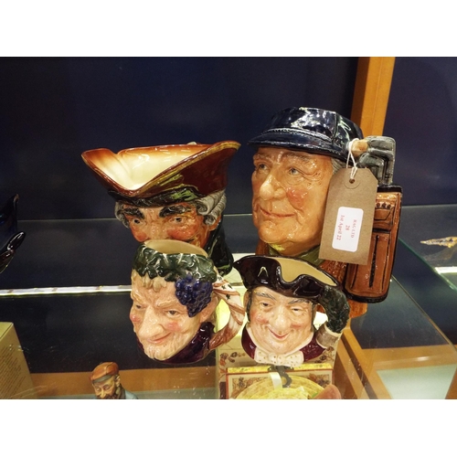 28 - Four Royal Doulton character jugs to include Dick Turpin, The Golfer, Mine Host and Bacchus