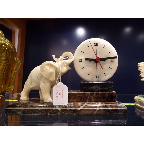 44 - An attractive Elephant clock on a marble base