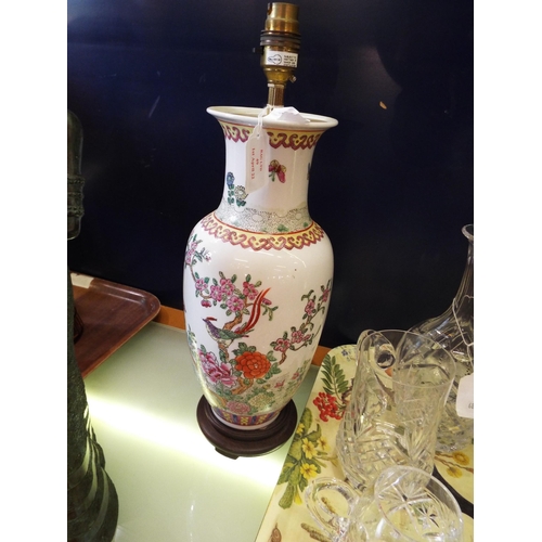 49 - A Chinese china table lamp having floral and bird decoration