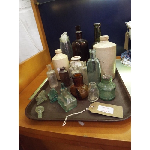 110 - A quantity of vintage glass and pottery jars and stoppers