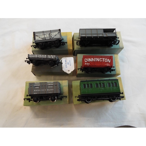 145 - A Hornby 468 Southern 4 wheel coach, a Mainline 'Dinnington' open wagon, a Hornby 101 coke wagon 'Ba... 