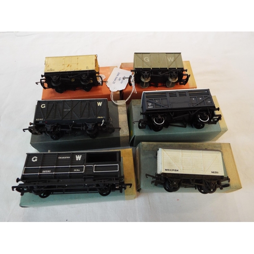 149 - A Hornby GWR LWB cattle wagon, a Slater GWR LWB Mink C, a Hornby Dublo 4320 BR refrigerated van, a T... 