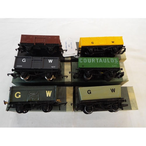 160 - A Hornby GWR ballast hopper, a Slater GWR mineral wagon, a Lima 305678 private 7 plank 'Courtaults L... 