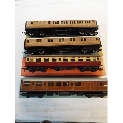 167 - A Hornby 436 LNER mainline brake coach, a Tri-ang 29 red and cream BR composite coach, a Hornby 448 ... 