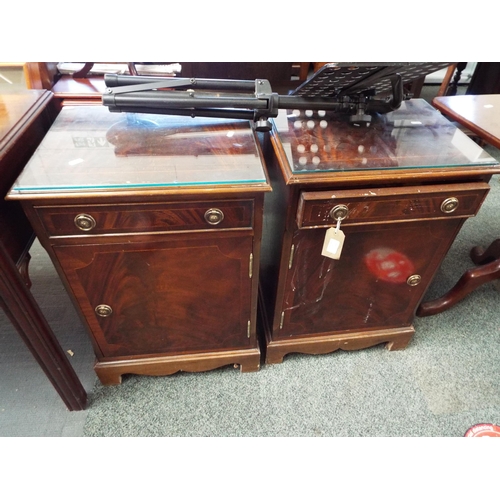 626 - A pair of mahogany side tables