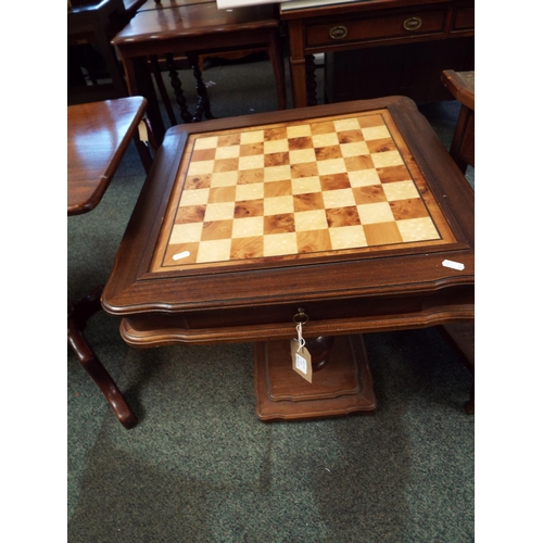 628 - A reproduction games table resting on pedestal base and single drawer