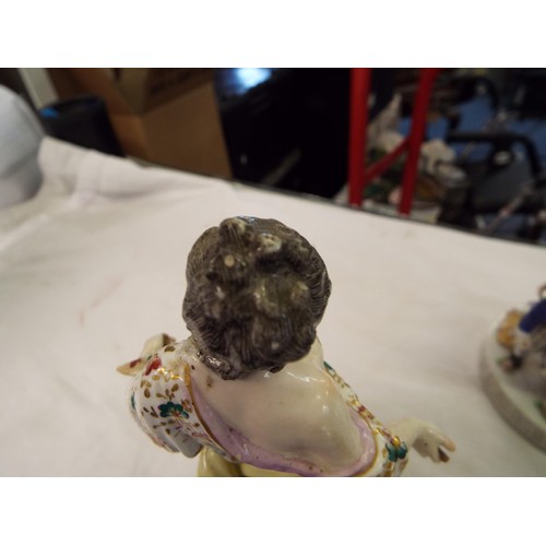 70 - Two German porcelain figurines for restoration