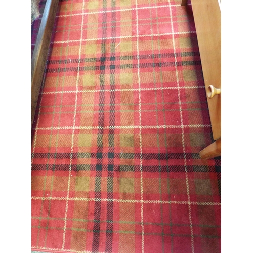 381 - A Glen Kilry red ground rug 120 x 170